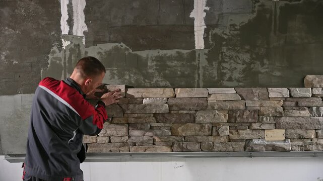 Stone Wall Finishing. Ensuring Even Gaps And Matching Colors In Stone Veneer Joints Completion