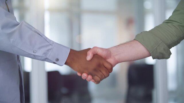 Cropped view male hands handshake two unknown multinational business men shaking hands at office sunny interior unrecognizable businessmen handshaking respect formal negotiation teamwork unity work
