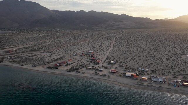 Watch aerial views of Bahia de Los Angeles as the sun sets over the Sea of Cortez in Baja California, Mexico.
