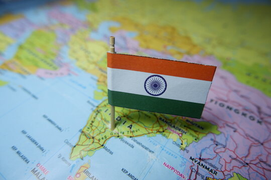 Travel to India Concept with Miniature National Flag Pin on Map