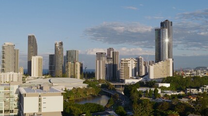 Fototapeta premium Aerial View of Gold Coast Skyline and Waterway at Sunset