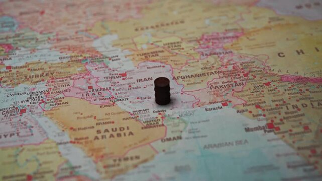 Oil on Iran map resource wealth concept.