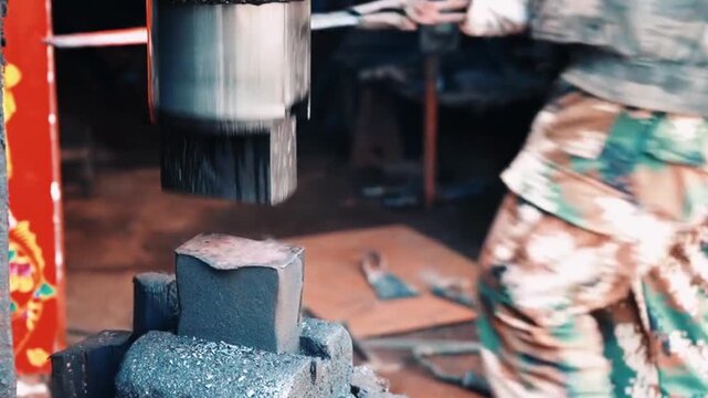 Forging steel with machines in factory	

