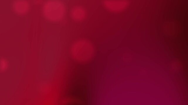Abstract background with blurred red light bokeh circles. Ideal for festive designs, holiday projects, captivating backgrounds, or energetic visuals.