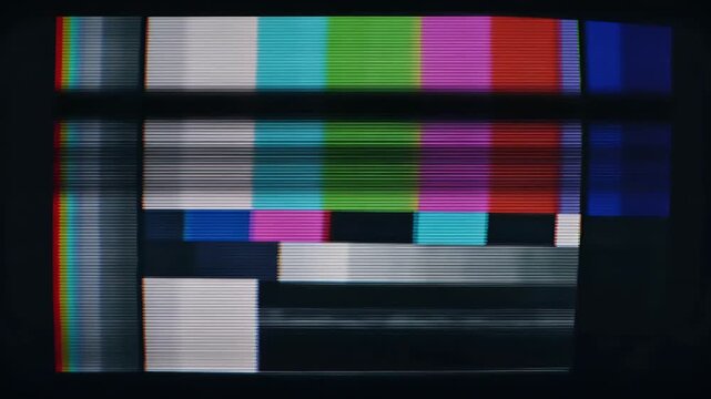 Vintage television test pattern with signal interference and glitching