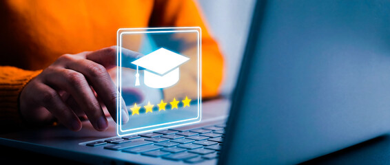 Online education concept with a student using a laptop to rate a course with five stars