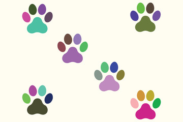 Fototapeta premium Colorful dog paw prints on cream background, animal tracks