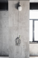 Temporary lighting in new apartment during renovation process Temporary hanging bulb lighting...