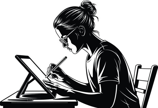 Focused woman wearing glasses using a digital tablet with a stylus for creative work