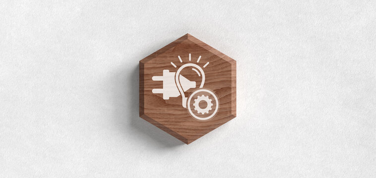 Wooden hexagon with an icon of a power plug and a lightbulb combined with a gear symbol representing electrical settings and energy innovation on textured white background