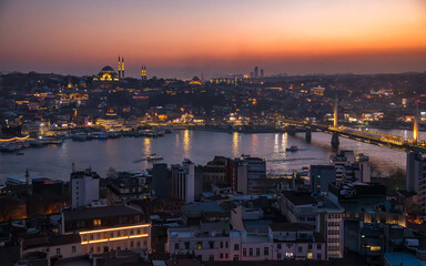 Fototapeta premium Sunset panorama view seen form Galata Tower with Hagia Sophia Blue Mosque Topkapi and another famous landmark in European or Asian parts of Istanbul Turkey 