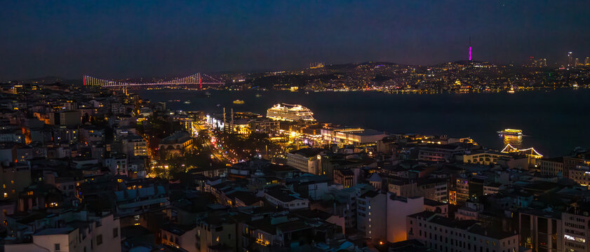 Blue hour panorama view seen form Galata Tower with Hagia Sophia Blue Mosque Topkapi and another famous landmark in European or Asian parts of Istanbul Turkey 