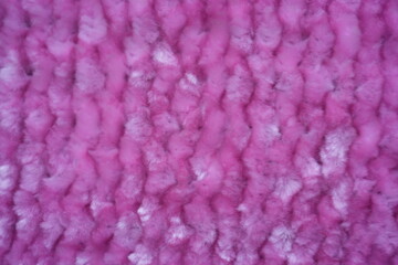pink fleece fabric texture background Close-up texture of soft pink fleece fabric. Abstract textile background with fluffy material and cozy fabric surface.   © Анна Климчук