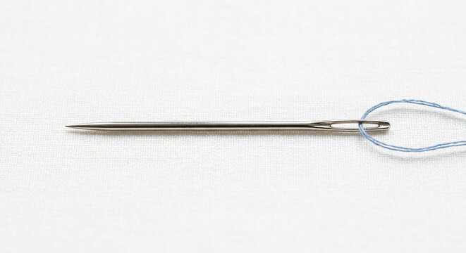 A sewing needle on a white backgroun