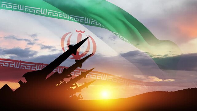 The missiles are aimed at the sky at sunset with Iran flag. Bomb, chemical weapons, missile defense, a system of salvo fire.
