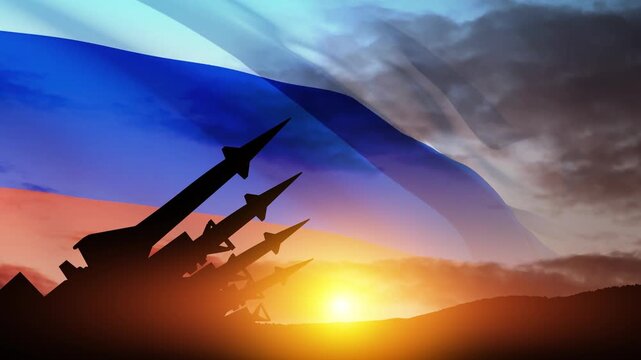 The missiles are aimed at the sky at sunset with Russian flag. Nuclear bomb, chemical weapons, missile defense, a system of salvo fire.