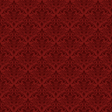 Luxury red damask seamless pattern background with ornate dark crimson floral elements for luxury textiles and festive backdrops.