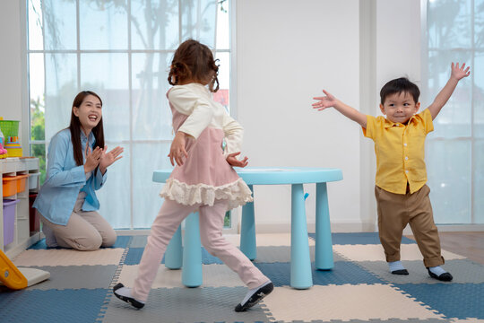 Fun Indoor Play with Kids and Carer at Activity Table
