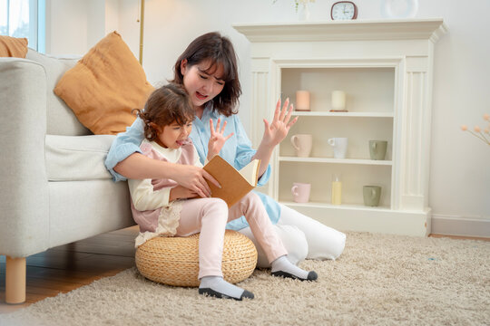 Joyful Mother-Son Reading Moments at Home