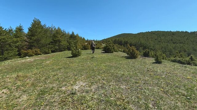 Clear blue sky above green hills. Mount Goc, Ljukten peak. Balkans, Serbia