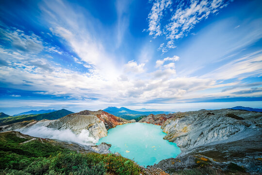 Ijen Crater Acidic Turquoise Lake and Sulfur Smoke Plume at Sunrise East Java