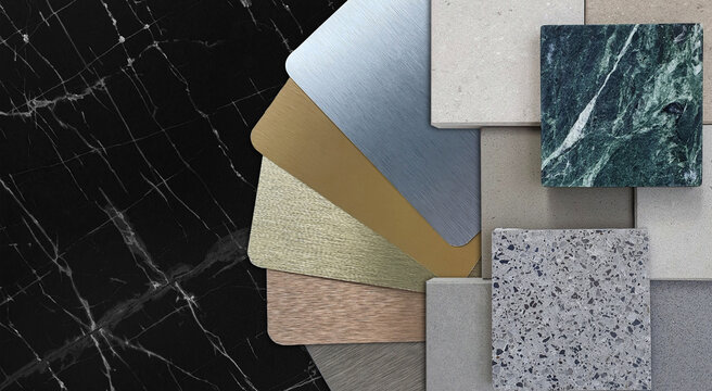 Luxury Interior Design Moodboard with Brushed Metal Swatches Terrazzo Tile Samples and Emerald Green Stone Plates on Black Nero Marquina Marble Background for Architecture Presentation Layout.