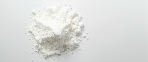 Fototapeta premium Bird's Eye View of Soft White Powdered Milk Pile Isolated on Bright Background, Minimalist