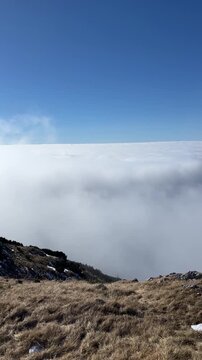 Above the clouds on Mount Stol, Slovenia