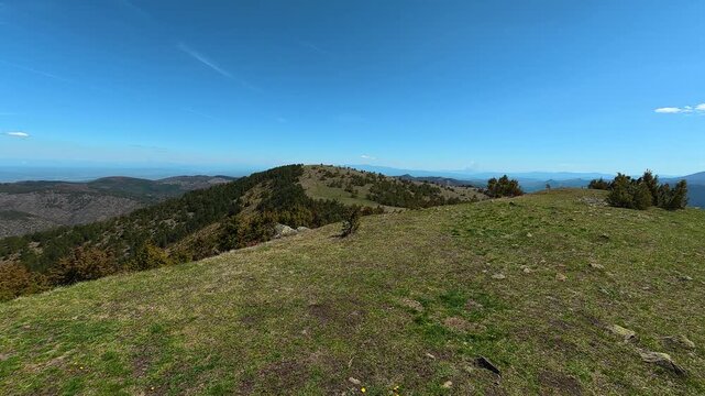Clear sky above rolling green hills. Mount Goc, Ljukten peak. Balkans, Serbia