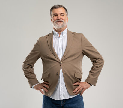 Smiling mature man posing isolated on white background