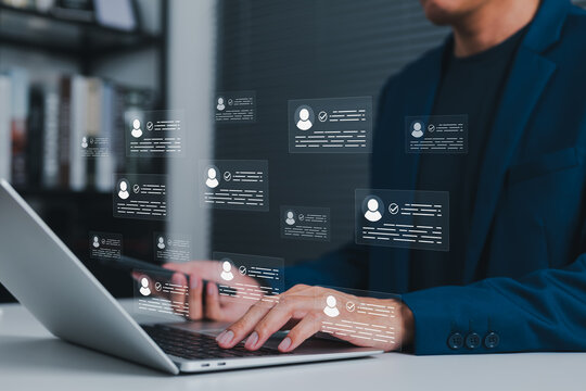 User profile management and identity verification concept. Person using laptop while multiple profile cards with checkmarks representing HR recruitment, database, digital identity system, KYC, ID Card