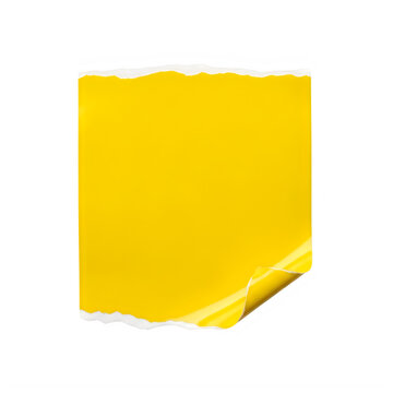 Yellow folded paper corner on flat surface