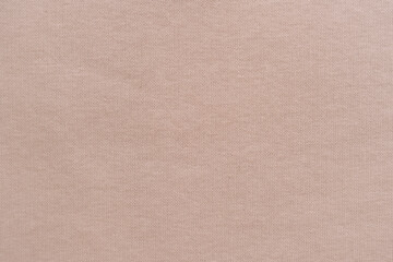 Fototapeta premium Beige fabric texture in close up.
