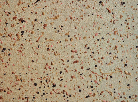 Vibrant dramatic paint splashes on the wall texture backdrop
