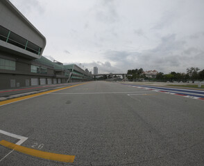 Fototapeta premium Singapore / December 2017: Pit lane and start finish line of the Formula One Racing track at Marina Bay Street Circuit. 