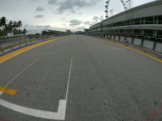 Fototapeta premium Singapore / December 2017: Pit lane and start finish line of the Formula One Racing track at Marina Bay Street Circuit. 