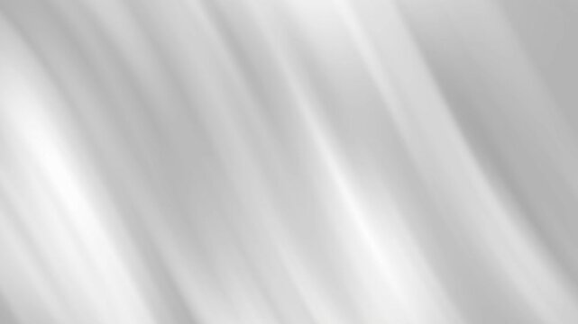 Grey gradient background featuring soft white fabric folds in an abstract design.