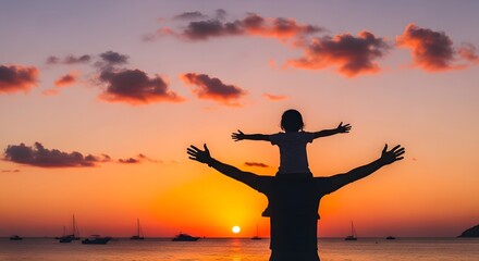 Fototapeta premium father and child enjoying sunset on beach with arms outstretched