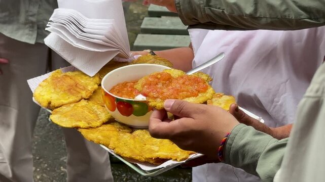 Colombian-Style Fried Plantains with Tomato-Onion Sauce (Patacones Con Hogao)
