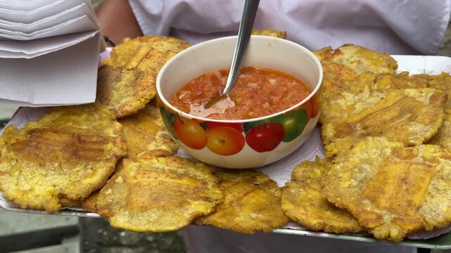 Colombian-Style Fried Plantains with Tomato-Onion Sauce (Patacones Con Hogao)