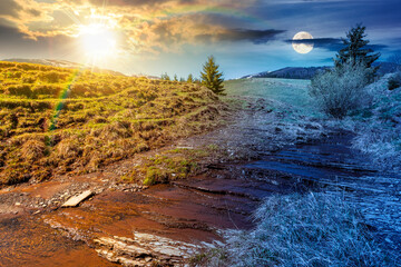 day meet night. rural scenery in carpathian mountains. sun and moon over simple view of a countryside mountain landscape during springtime at twilight. brook near the grassy hills. harmony concept © Pellinni
