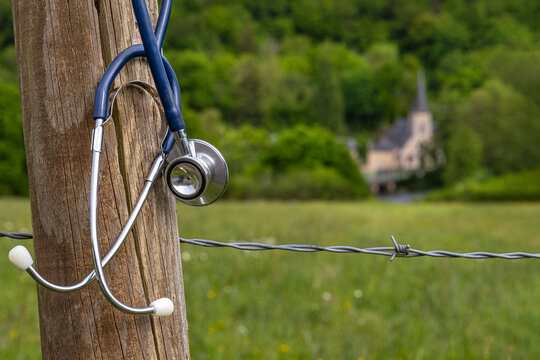 SThe concept of a medical desert, a shortage of rural doctorstethoscope Hangs by Field and House
