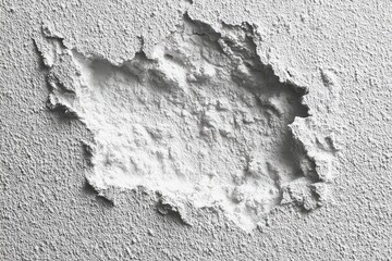 Obraz premium Rough, textured surface with a large, irregular void revealing underlying texture