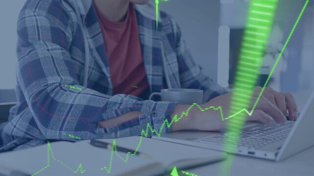 Adult male typing on laptop at desk, causing market chart rising, obscuring laptop, analyzing data