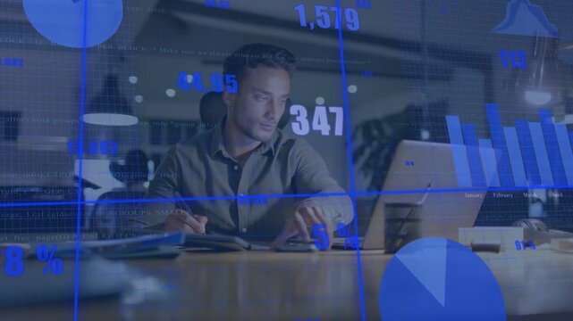 Analyst focusing on laptop typing and checking phone with blue chart overlay updating for analytics
