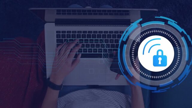 Woman typing on laptop with phone, authenticating via security HUD extending circuits across keys