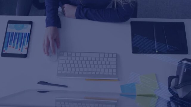 Woman typing on keyboard, causing blue code overlay, reaching tablet, using mouse, analyzing data