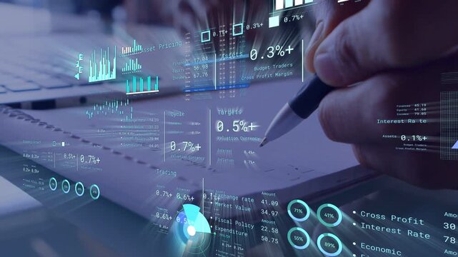 Man approaching notepad and marking printed rows on desk, HUD finance charts animating over laptop