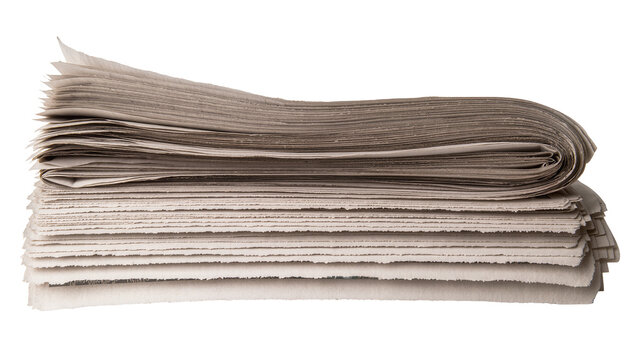 Stack of folded newspapers with rough edges, isolated on transparent background