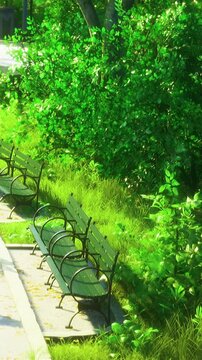 The park has a lamp post next to lush green bushes and grass under bright sunlight. The scene shows a vibrant atmosphere with new growth, indicating early spring.
